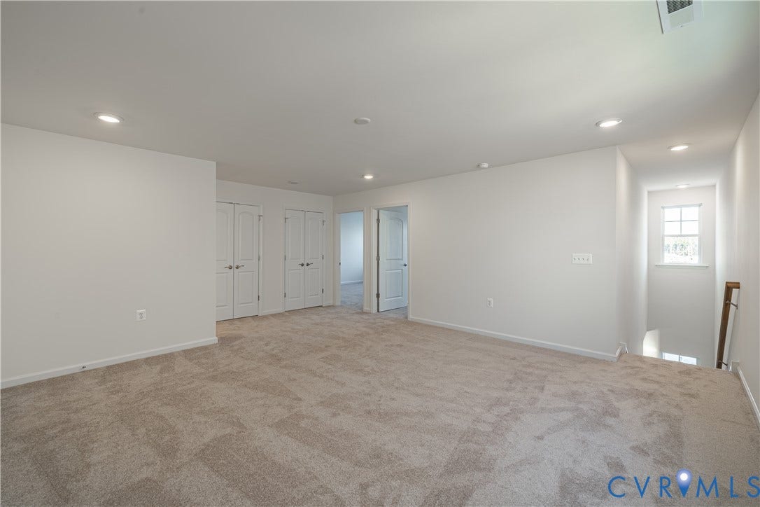 505 Bayberry Lane, Spring Creek, Zion Crossroads, VA 22942 Upstairs, you'll find a spacious loft area with carpet flooring.