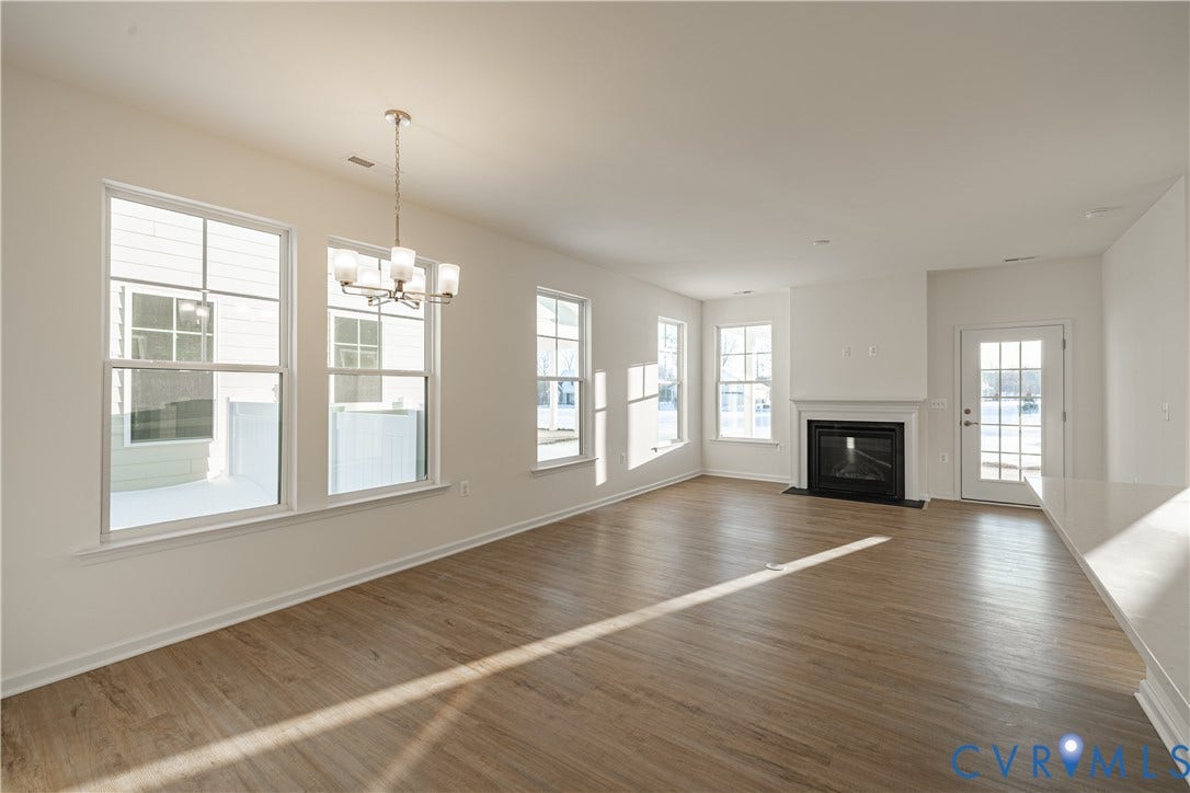 505 Bayberry Lane, Spring Creek, Zion Crossroads, VA 22942 Natural light pours into the great room from several large windows overlooking the covered patio. A gas fireplace completes the great room.
