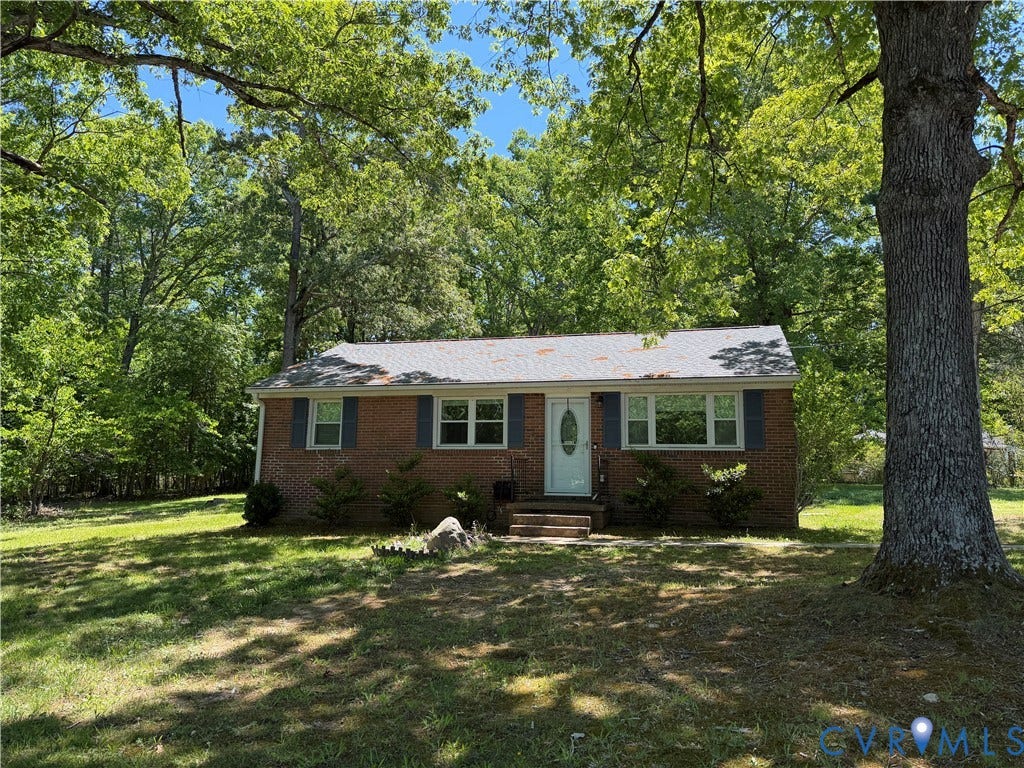 1611 Anderson Highway, Powhatan, VA 23139 Brick ranch-style residence featuring a prominent mature tree in the foreground