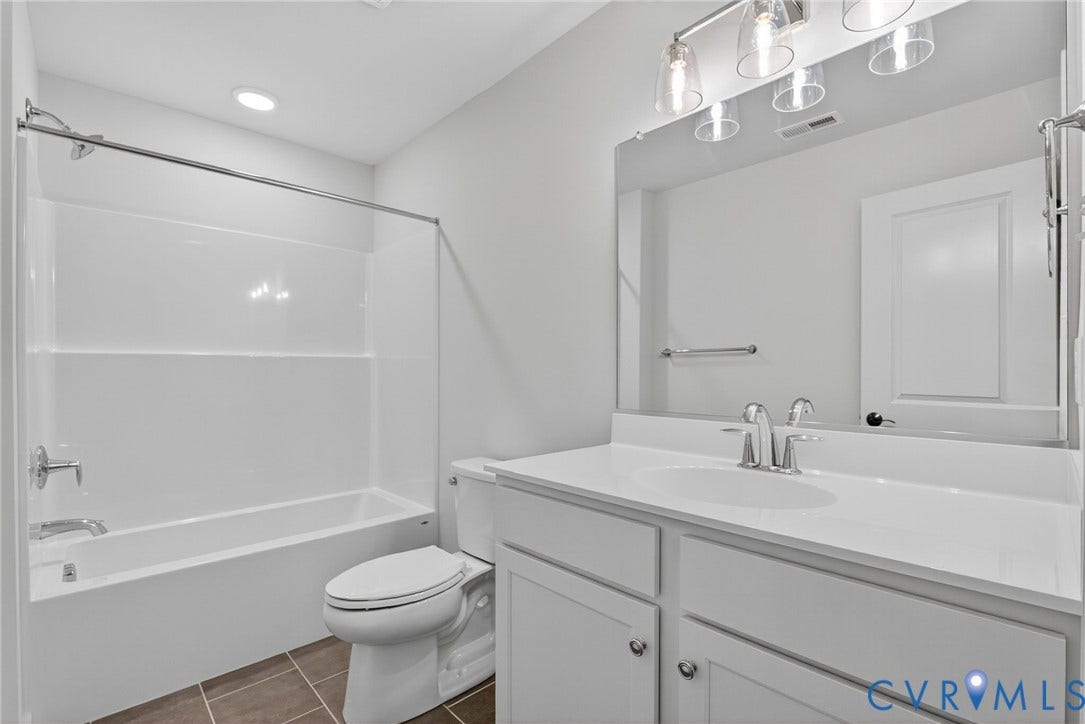 Photo from Boone Homes Gallery; photo of similar home, not home for sale; upgrades shown