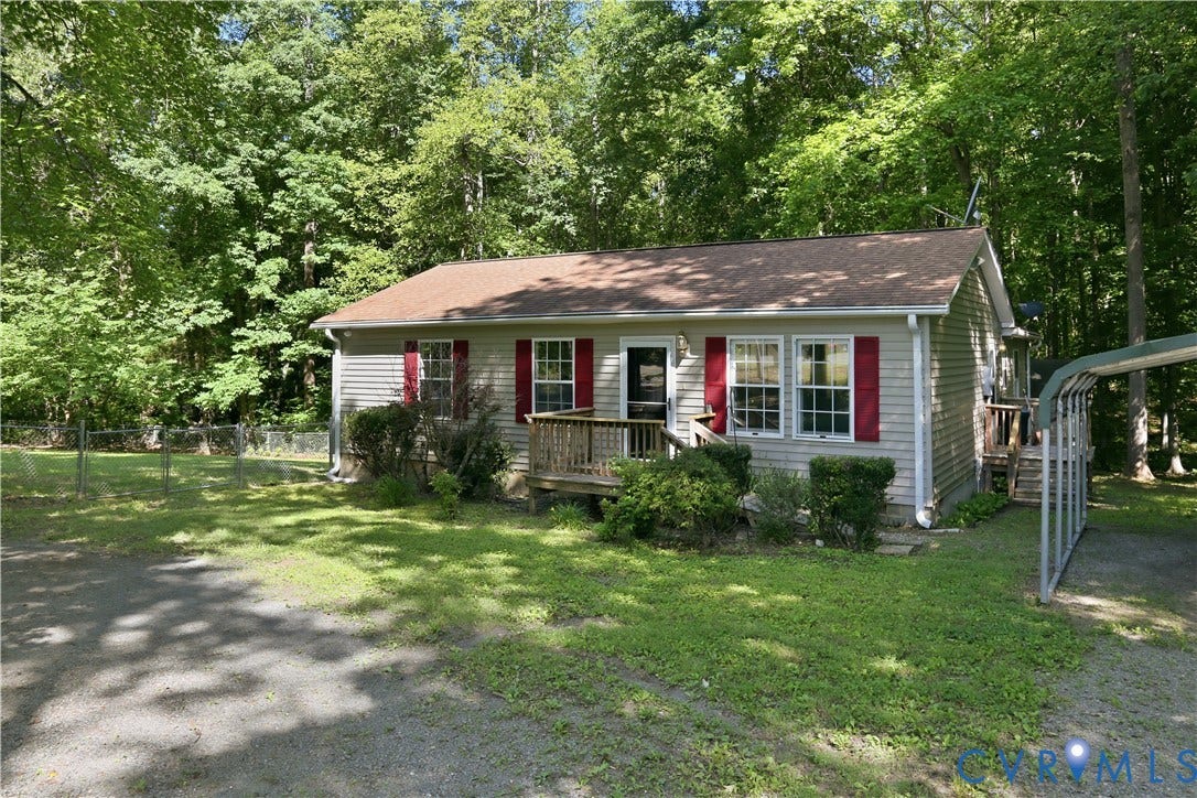 1637 Gardners Road, Mineral, Mineral, VA 23117 Single-story residence featuring light-colored siding, a front porch, and a brown shingle roof