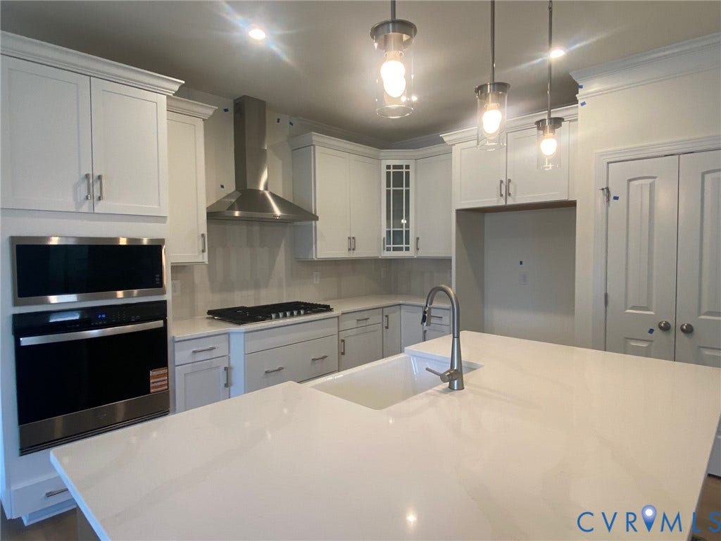 2605 Forget Me Not Lane, Greenhouse, Glen Allen, VA 23060 Whirlpool SS appliances. Quartz countertops; White farmhouse sink.
