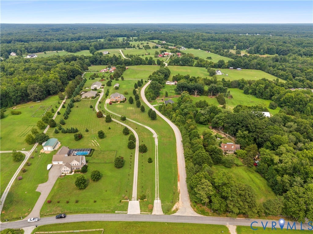 270 Petersburg Road, 4.34 Acre Lot - No Hoa, Powhatan, VA 23139 Expansive property featuring a large residence with a private swimming pool, extensive green lawns, mature trees, and multiple long driveways