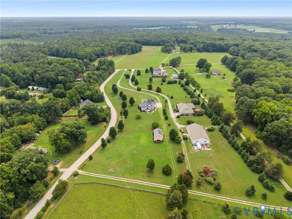270 Petersburg Road, 4.34 Acre Lot - No Hoa, Powhatan, VA 23139 Expansive aerial landscape featuring a variety of properties amidst lush green fields and mature tree lines