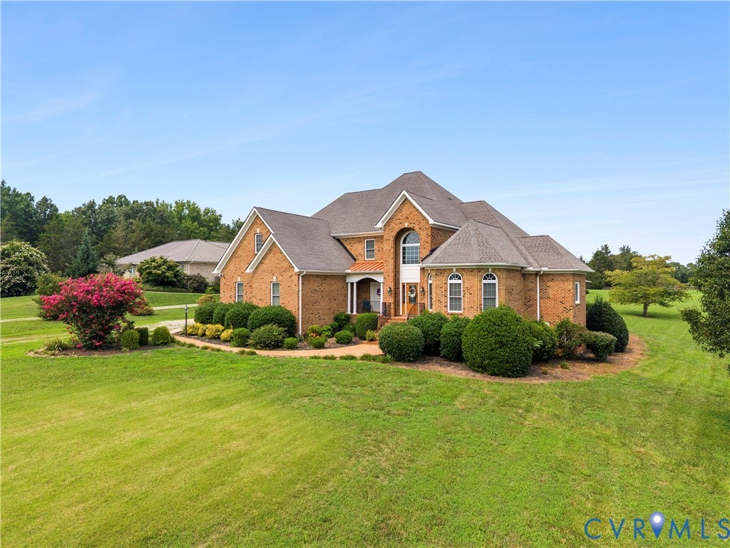 270 Petersburg Road, 4.34 Acre Lot - No Hoa, Powhatan, VA 23139 Traditional brick residence featuring a prominent arched entry, multiple gabled rooflines, and a circular drive