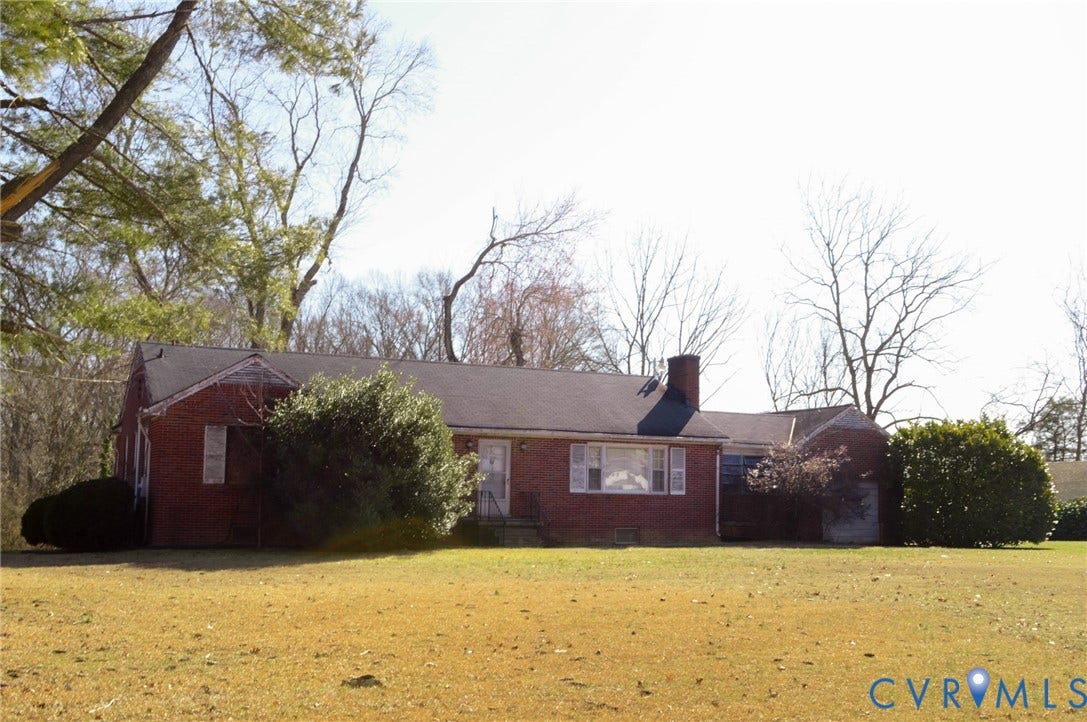 2500 Maidens Road, Powhatan, VA 23139 Ranch-style house featuring brick siding, a chimney, and a front lawn