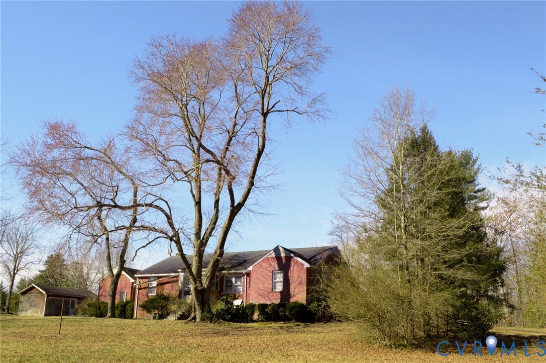 2500 Maidens Road, Powhatan, VA 23139 View of home's exterior featuring a yard