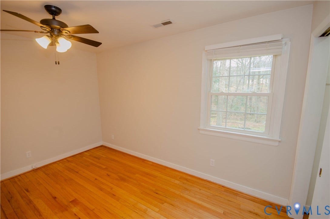 2231 Fall Line Drive, Powhatan, VA 23139 Spare room with light wood-style flooring and a ceiling fan