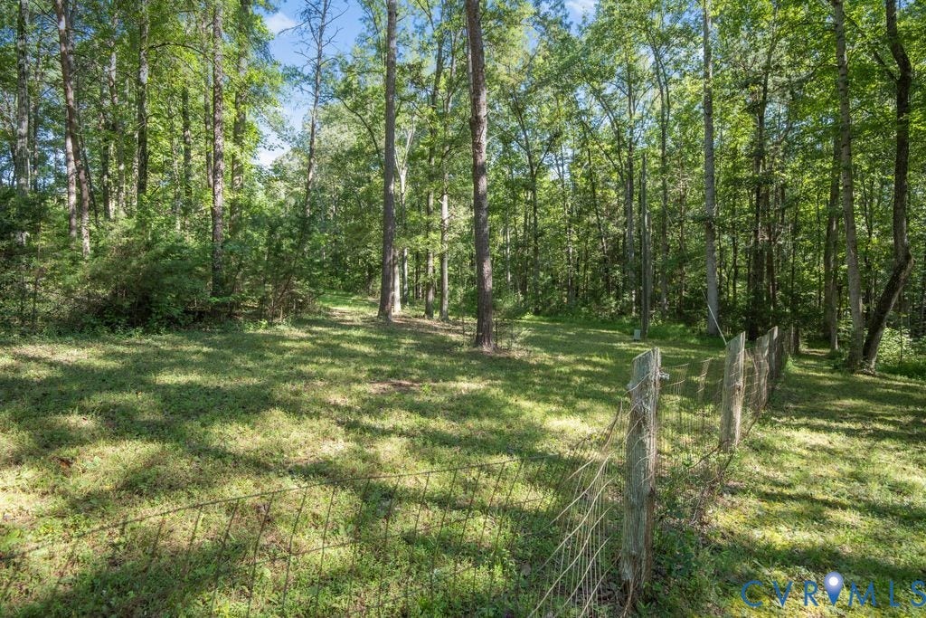 2900 Pleasantwood Road, Powhatan, VA 23139 Front yard with partial fencing