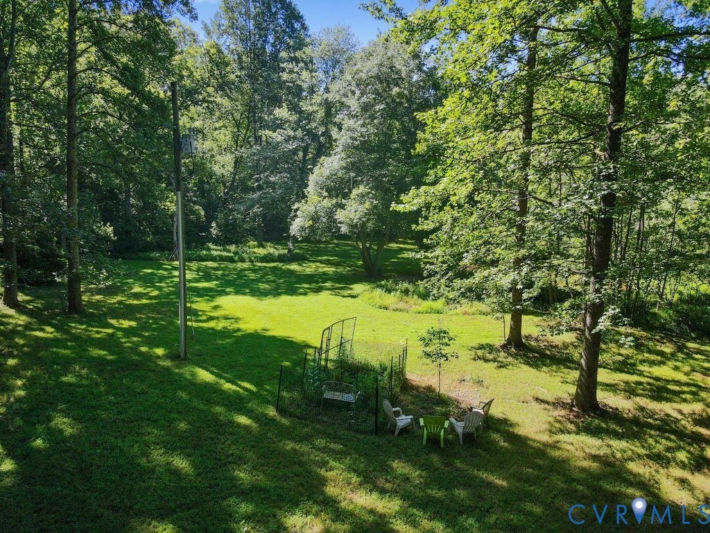 2900 Pleasantwood Road, Powhatan, VA 23139 Backyard garden, green space, and pond