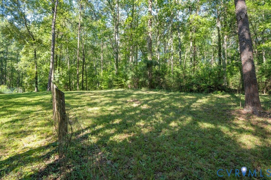 2900 Pleasantwood Road, Powhatan, VA 23139 front yard with partial fencing