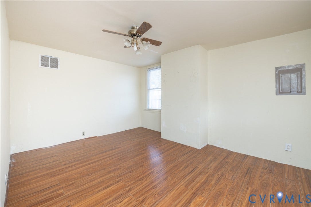 2606 Cedar Street, Richmond, VA 23223 Empty room featuring wood finished floors and ceiling fan