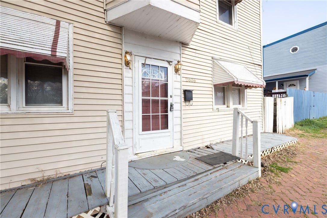 2606 Cedar Street, Richmond, VA 23223 Doorway to property with a wooden deck
