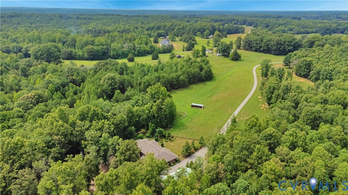 4337 Riddles Bridge Road, Riddles Bridge, Goochland, VA 23063 Expansive property featuring dense mature trees and open grassy areas