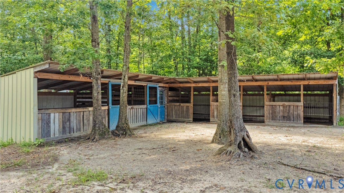 4337 Riddles Bridge Road, Riddles Bridge, Goochland, VA 23063 Multi-stall barn structure featuring a metal roof and light green siding