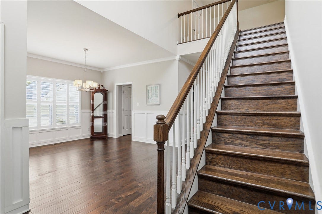 8907 Lavenham Loop, Lavenham, Midlothian, VA 23112 Stairs to second level and view of dinning room