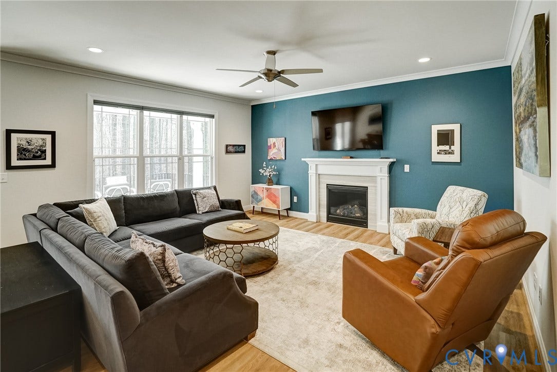 12387 S Readers Circle, Readers Branch, Manakin Sabot, VA 23103 Comfortable Great Room with Wood Floor, Gas Fireplace, and Woodland Views
