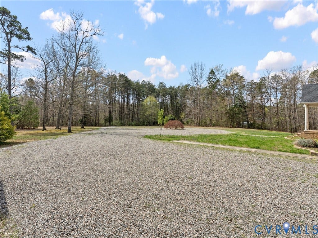 425 Starview Lane, Gum Spring, VA 23065 Front yard with beautiful Japanese Maple highlighting this serene setiitng.