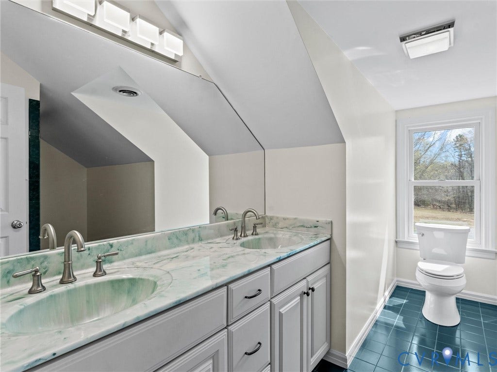 425 Starview Lane, Gum Spring, VA 23065 Second floor hall bath with marble double vanity