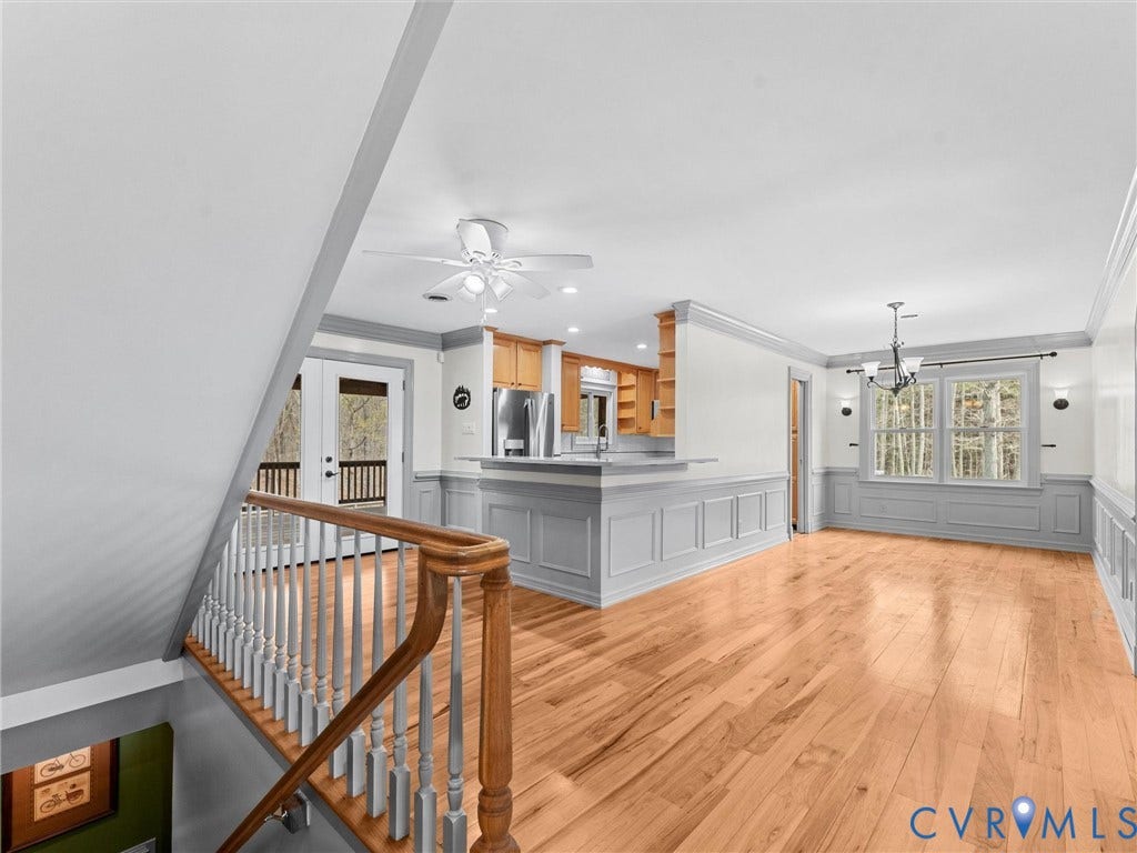 425 Starview Lane, Gum Spring, VA 23065 Large open area that has two spaces one can serve as a dining room and the other as an eating area.