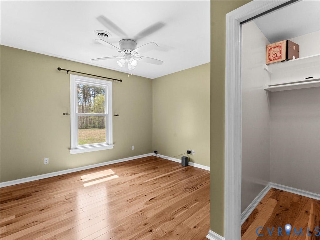425 Starview Lane, Gum Spring, VA 23065 Bedroom #2 also on first floor bedroom with large closet and hickory floors