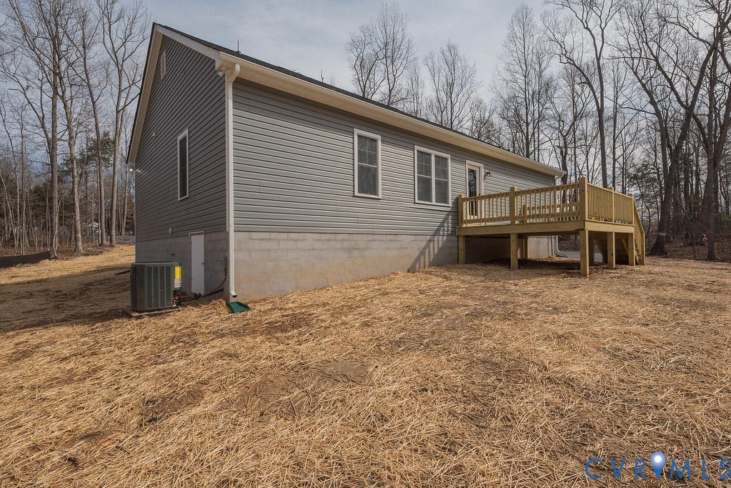 1164 Jefferson Highway, Moseley Estates, Louisa, VA 23093 Rear view of property with a wooden deck