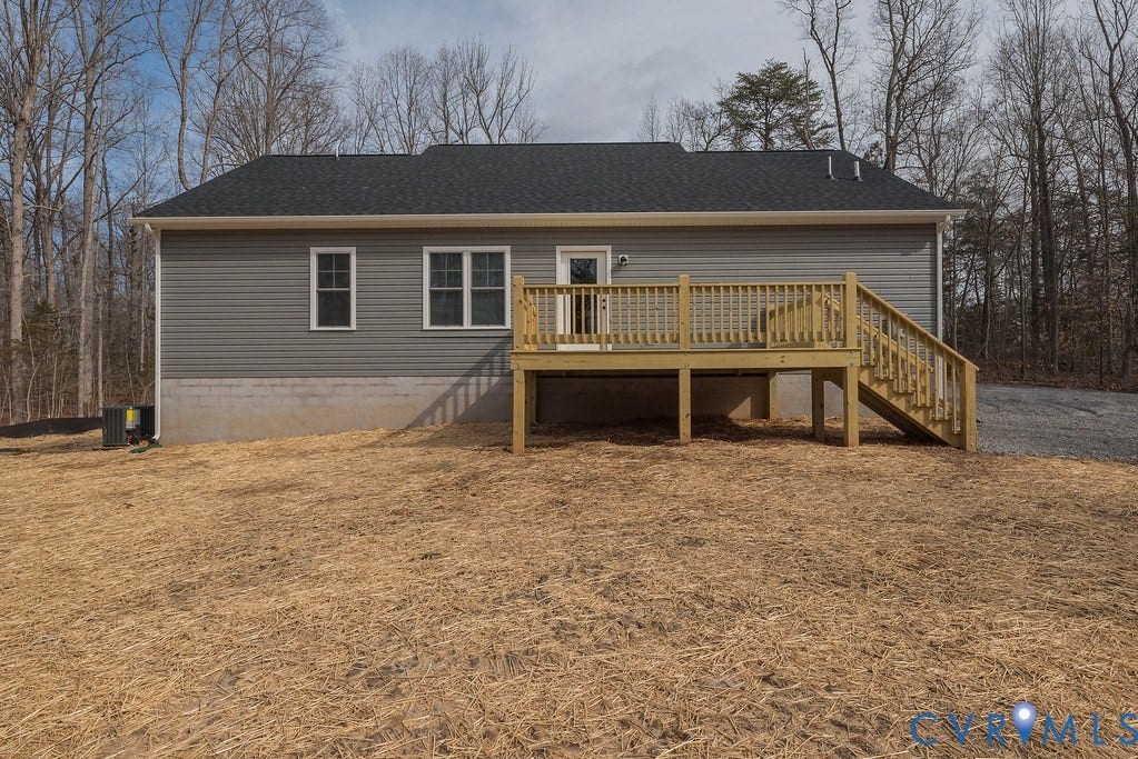 1164 Jefferson Highway, Moseley Estates, Louisa, VA 23093 Back of house with a wooden deck, stairs, and a shingled roof