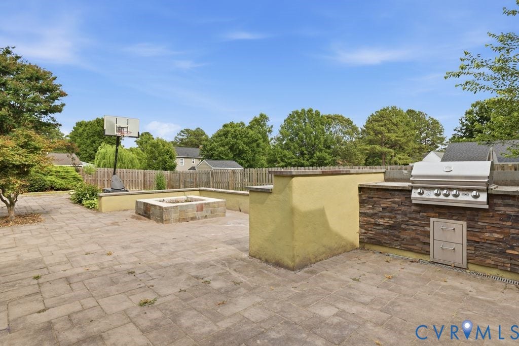 11721 Cedar Lane, Chester, VA 23831 outdoor kitchen and fire pit