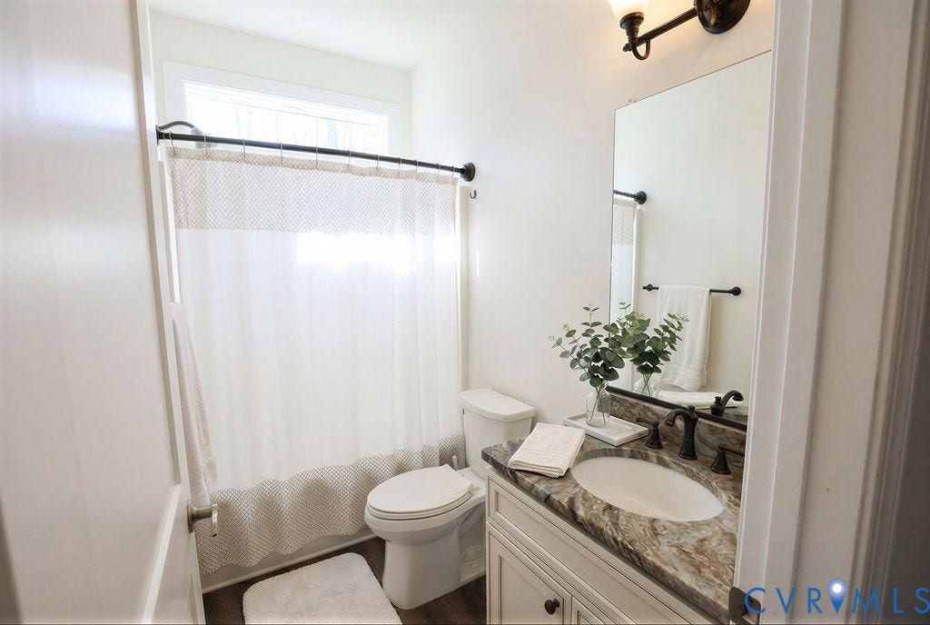 5670 Hickory Street, Powhatan, VA 23139 Bathroom with vanity and toilet
