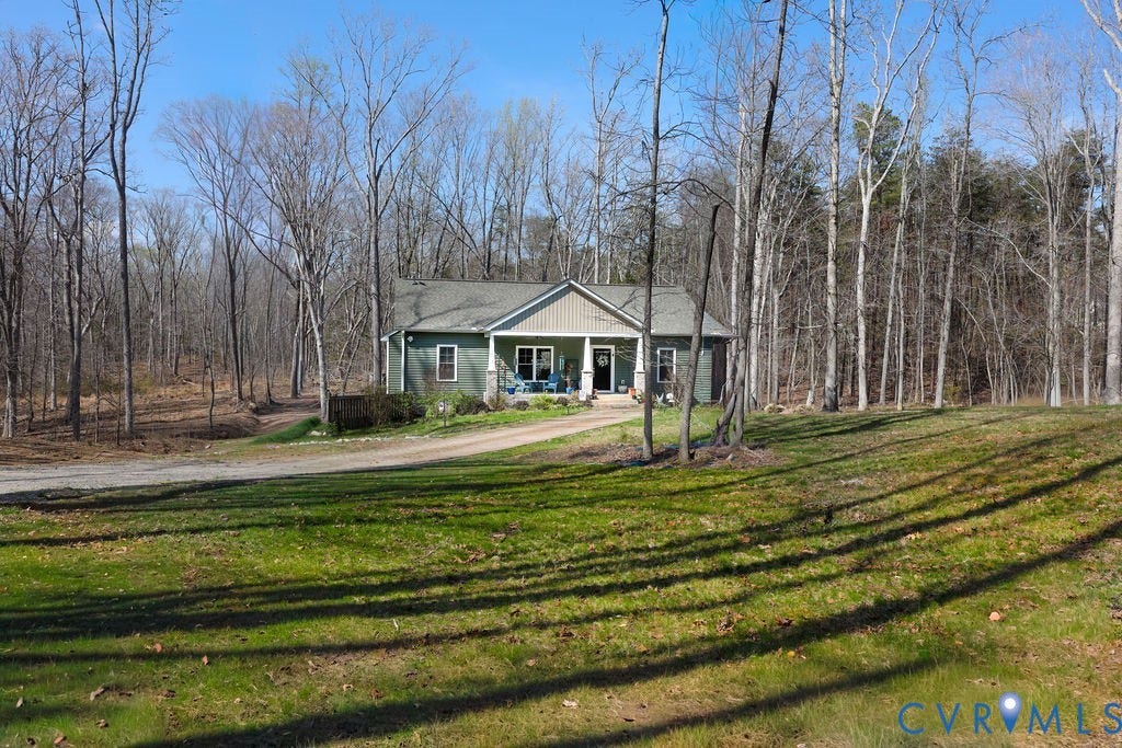 5670 Hickory Street, Powhatan, VA 23139 View of front of house featuring covered porch, a front yard, and driveway