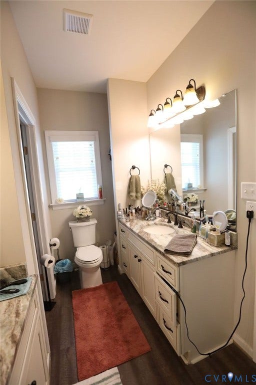 5670 Hickory Street, Powhatan, VA 23139 Bathroom featuring vanity and dark wood finished floors