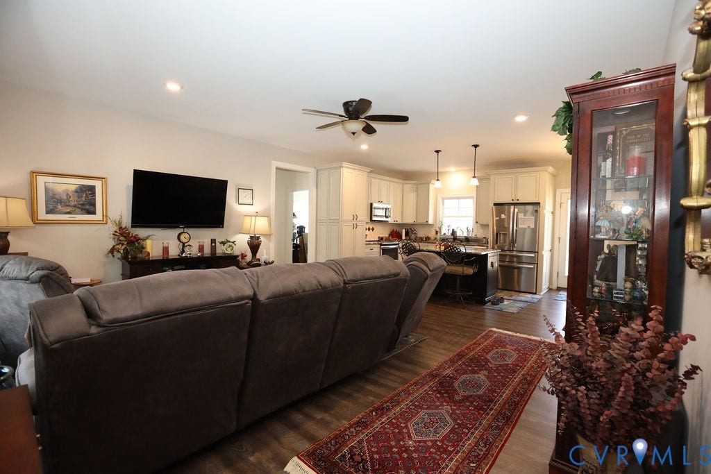 5670 Hickory Street, Powhatan, VA 23139 Living room featuring dark wood-style floors, a ceiling fan, and recessed lighting