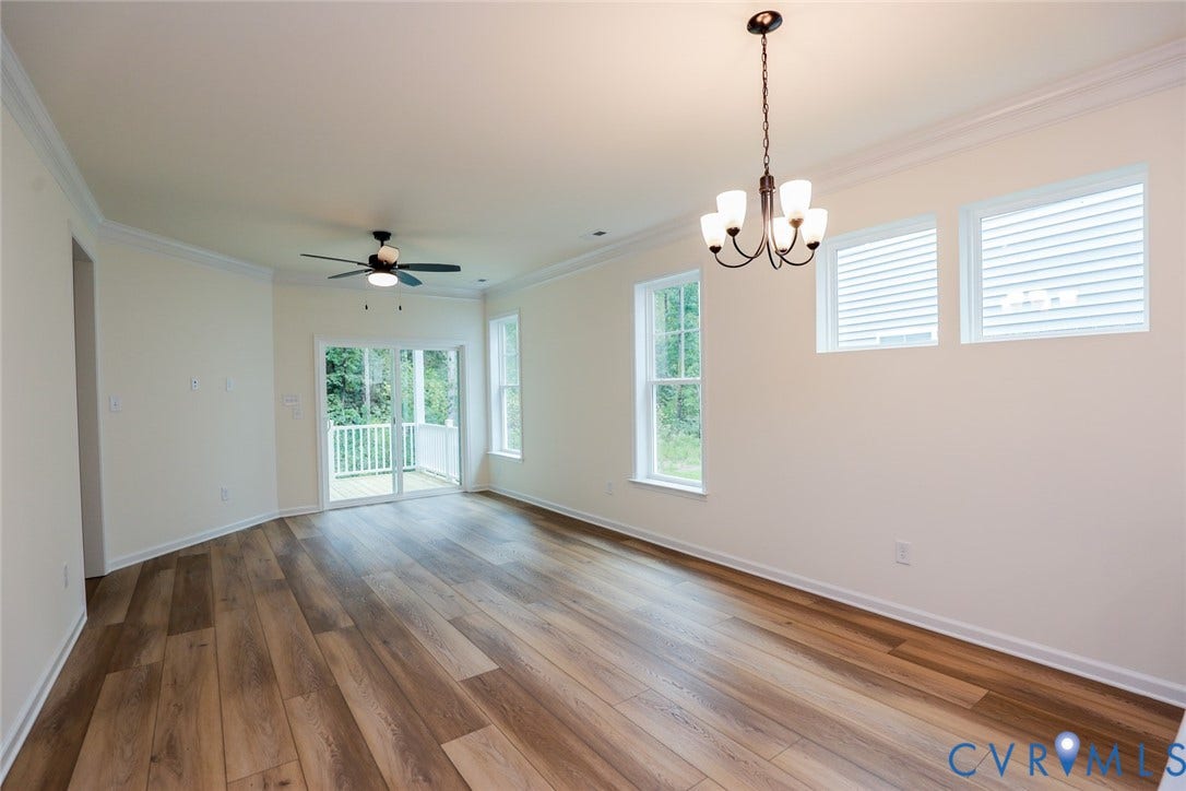 6305 Lila Crest Lane, Cottages At Millwood, Chesterfield, VA 23112 The photo represents the plan, not the actual home. Design selections may vary. The adjoining dining area is open to the light and bright family room.