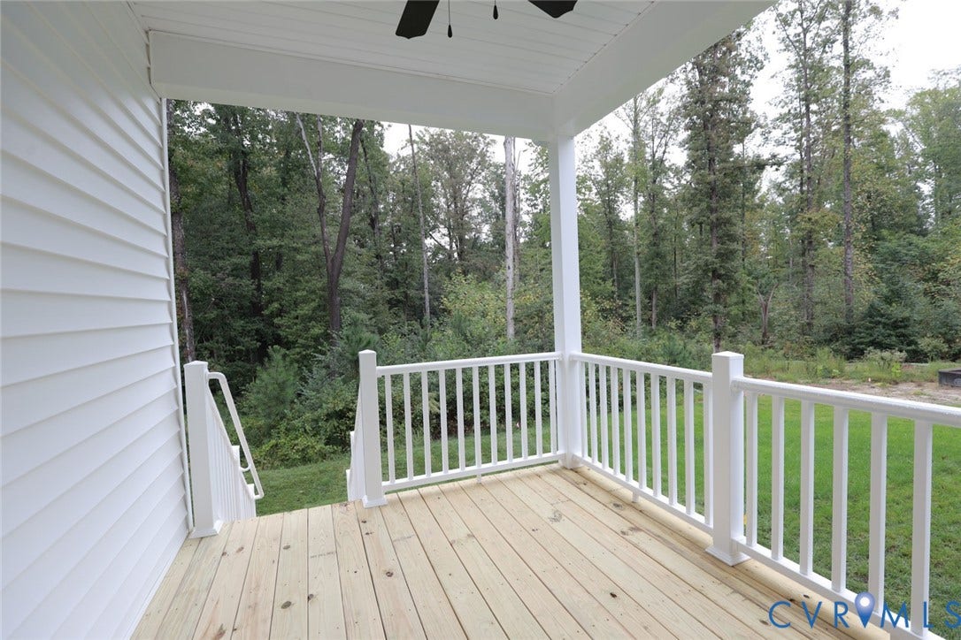 6305 Lila Crest Lane, Cottages At Millwood, Chesterfield, VA 23112 The photo represents the plan, not the actual home. Design selections may vary. A covered porch is situated off of the primary bedroom, perfect for relaxing evenings and morning coffee.