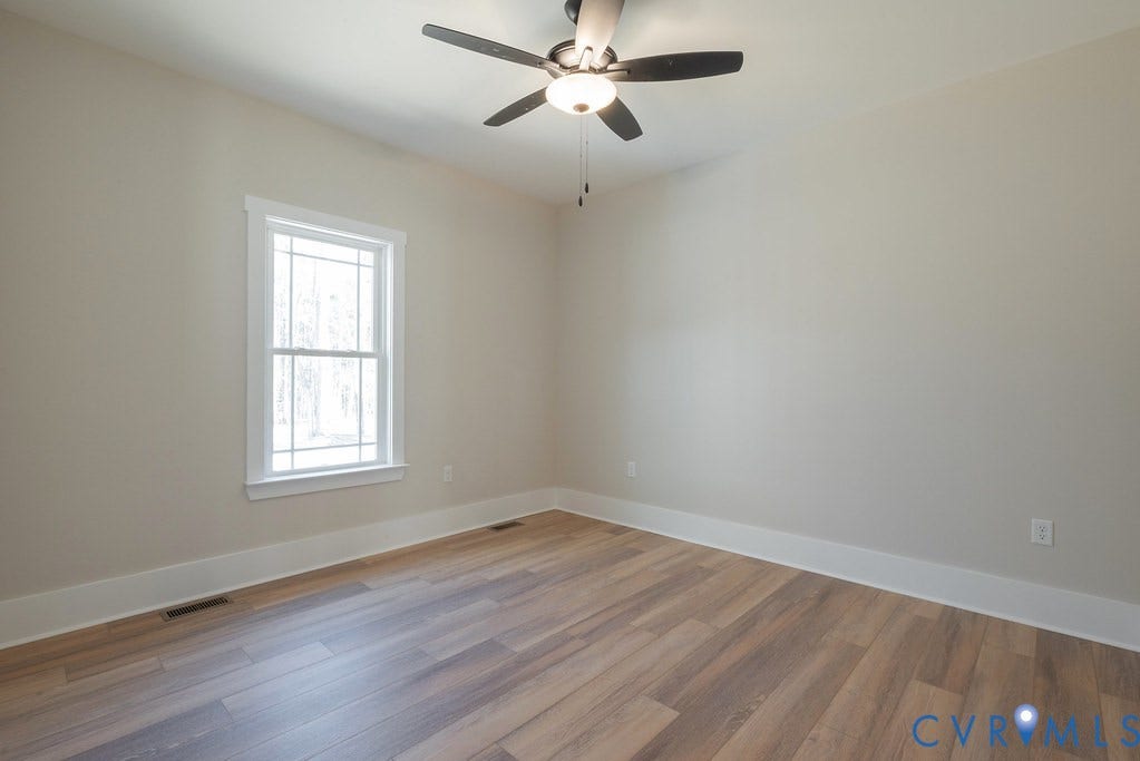 TBD Black Haw Lane, Hanover, VA 23059 Unfurnished room with wood finished floors and a ceiling fan