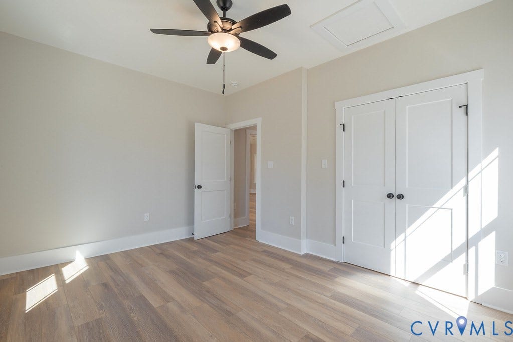 TBD Black Haw Lane, Hanover, VA 23059 Unfurnished bedroom featuring a ceiling fan, light wood-style floors, and a closet