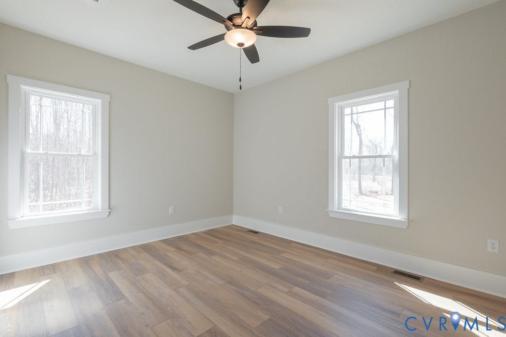 TBD Black Haw Lane, Hanover, VA 23059 Unfurnished room with wood finished floors and ceiling fan
