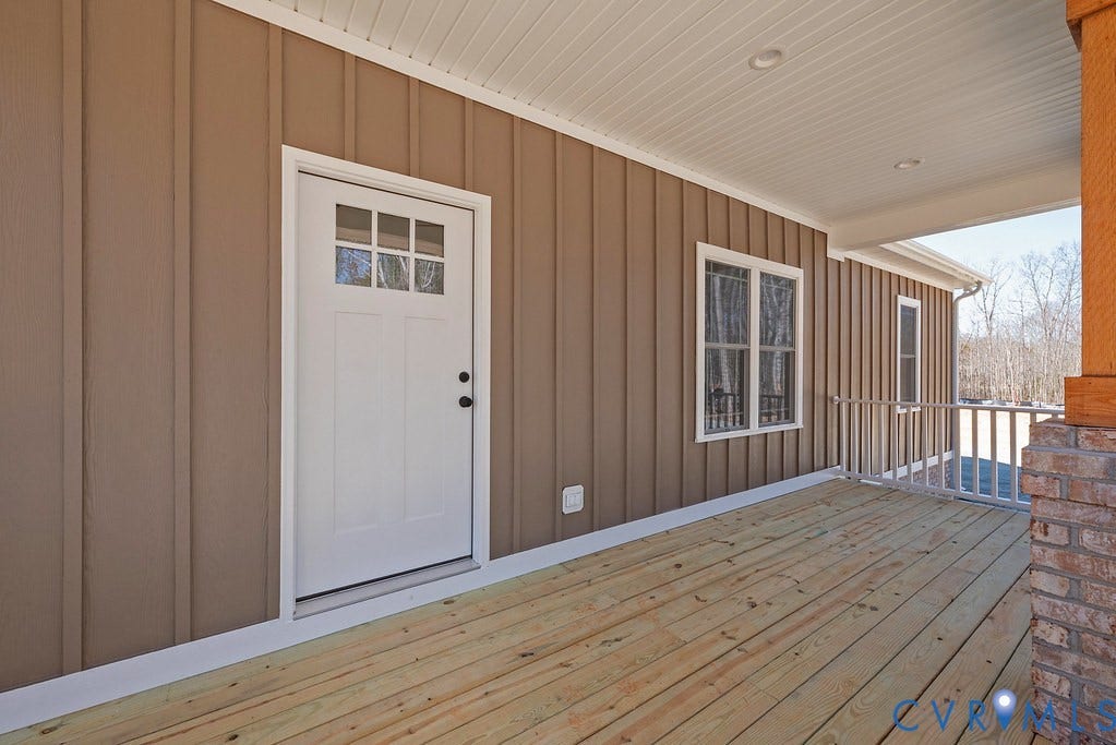 TBD Black Haw Lane, Hanover, VA 23059 Doorway to property featuring board and batten siding and a wooden deck