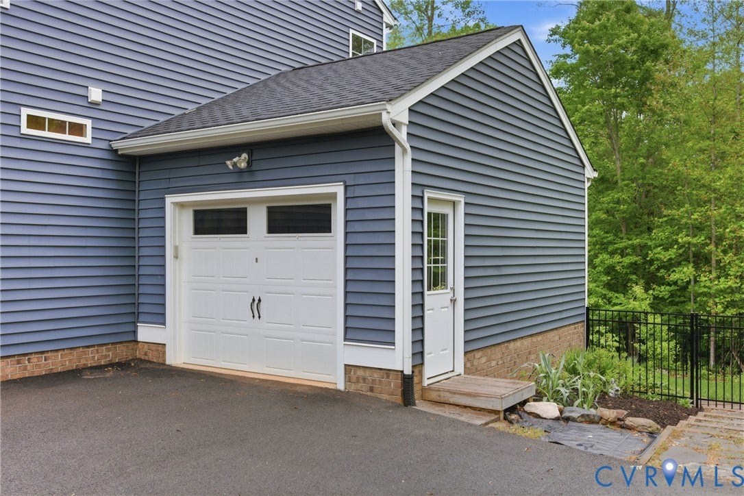 3638 Walkers Creek, Powhatan, VA 23139 1 car garage; great workshop area.