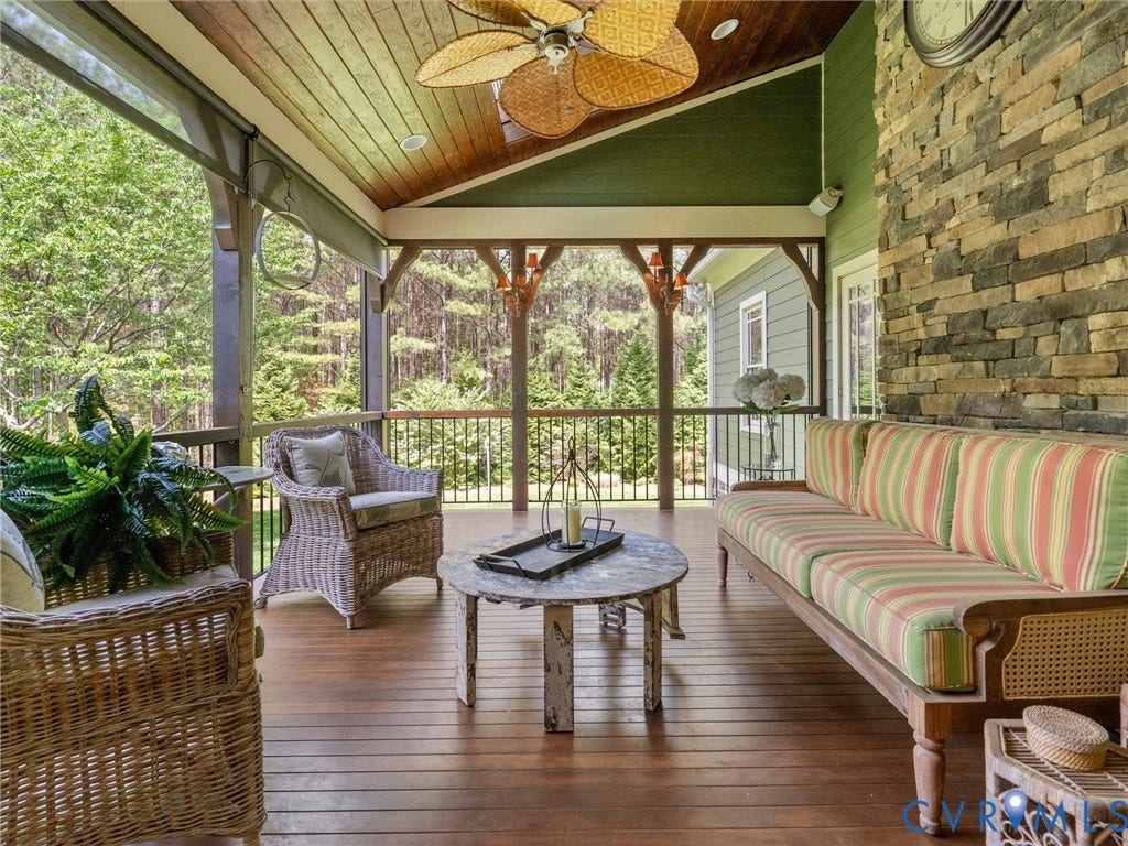 3025 Mill Mount Lane, Powhatan, VA 23139 Back Porch with mahogany floors and retractable screens/ shades