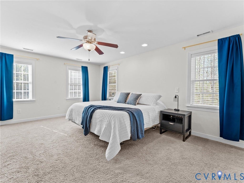 110 Oak Knoll Place, Bumpass, VA 23024 Generous sized primary bedroom with walk in closet, and en suite bath