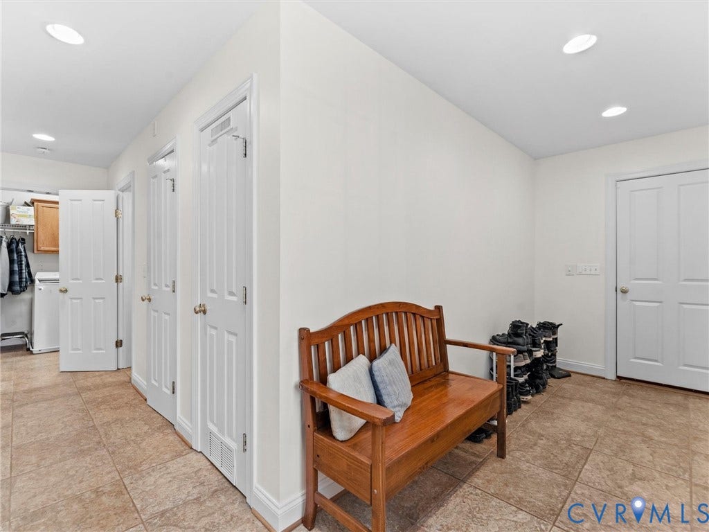 110 Oak Knoll Place, Bumpass, VA 23024 Drop zone in utility passthrough with additional exterior access and garage access