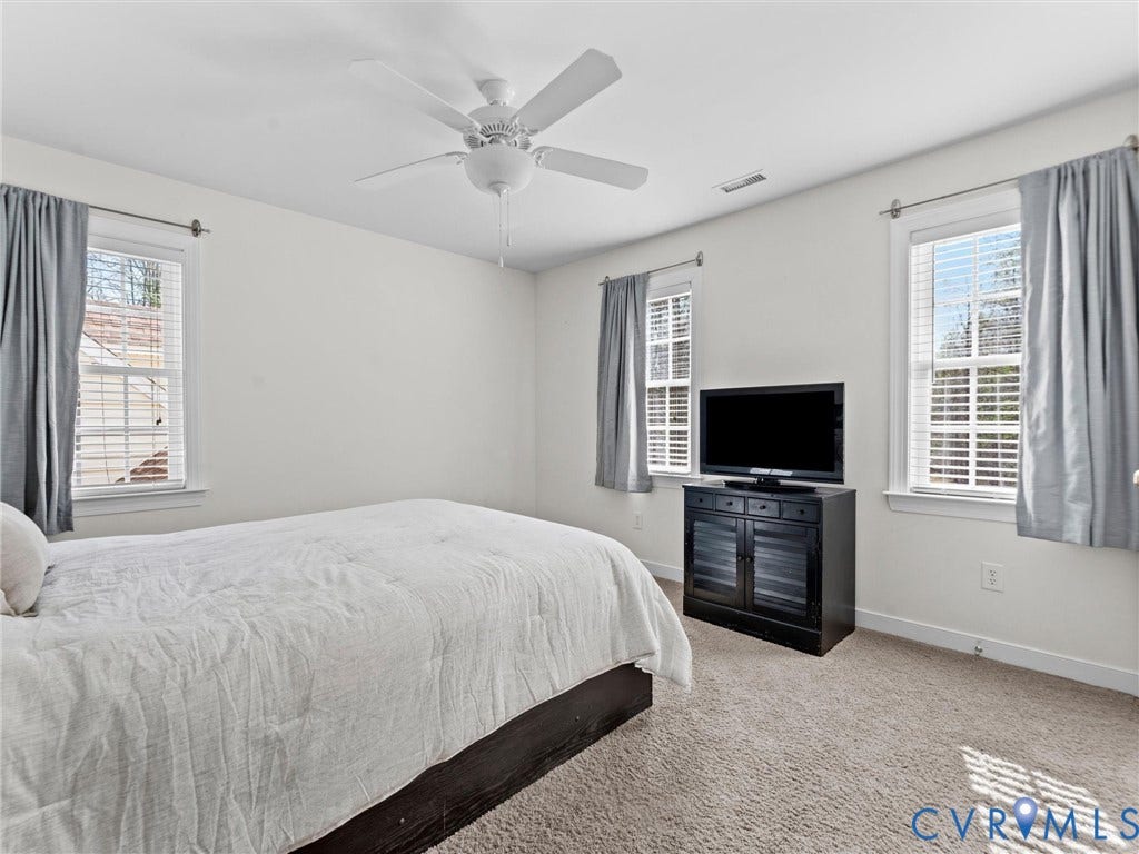 110 Oak Knoll Place, Bumpass, VA 23024 bedroom 3 with carpet, large closet, and ceiling fan