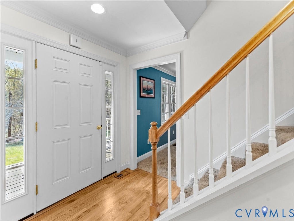110 Oak Knoll Place, Bumpass, VA 23024 Bright and inviting foyer with gorgeous hardwood flooring