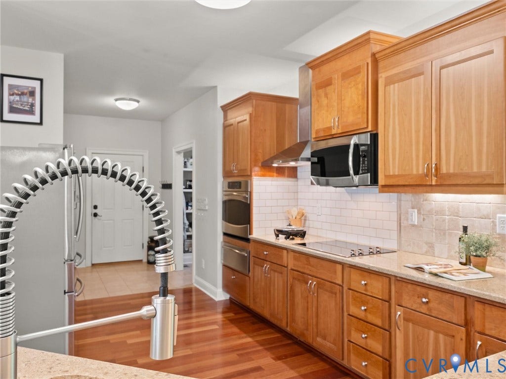 8151 Hidden Valley Court, Hidden Valley, Amelia, VA 23002 Kitchen & entrance to garage & pantry