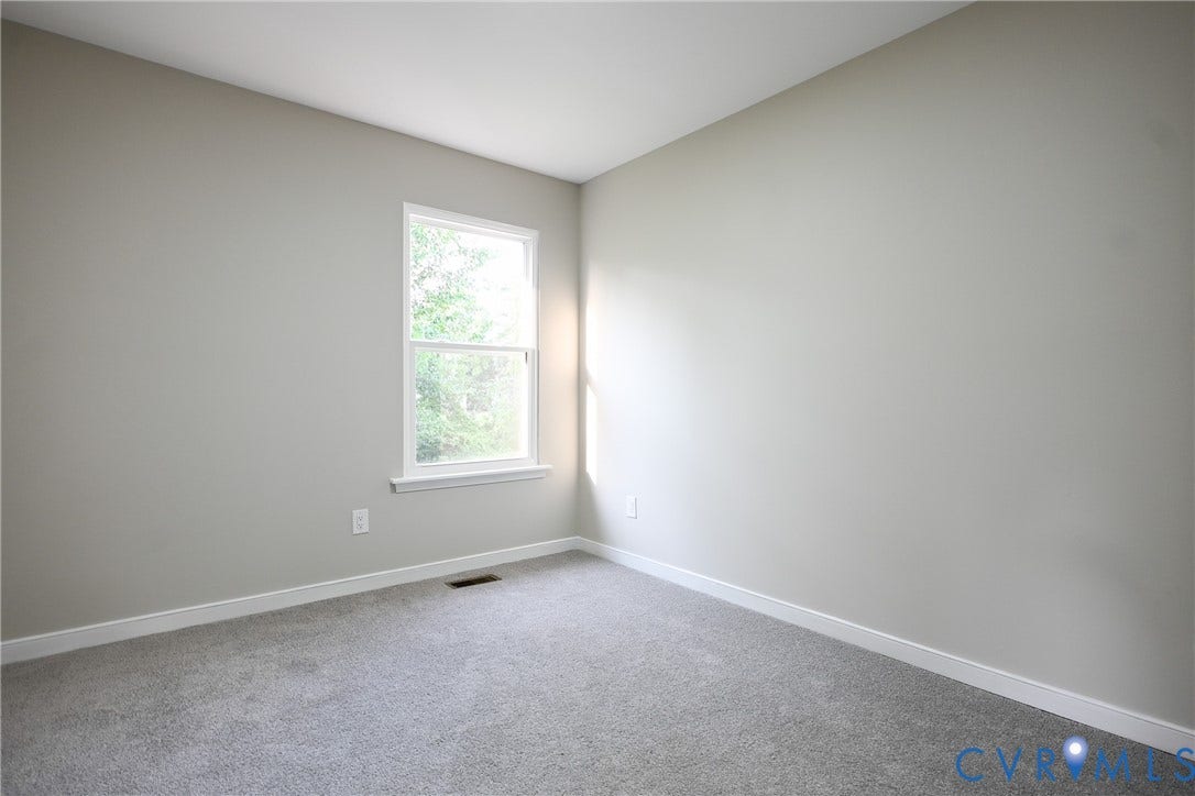 912 Harmony Road, Fairfield, VA 23059 Neutral gray wall finishes, light gray carpeting, and white trim