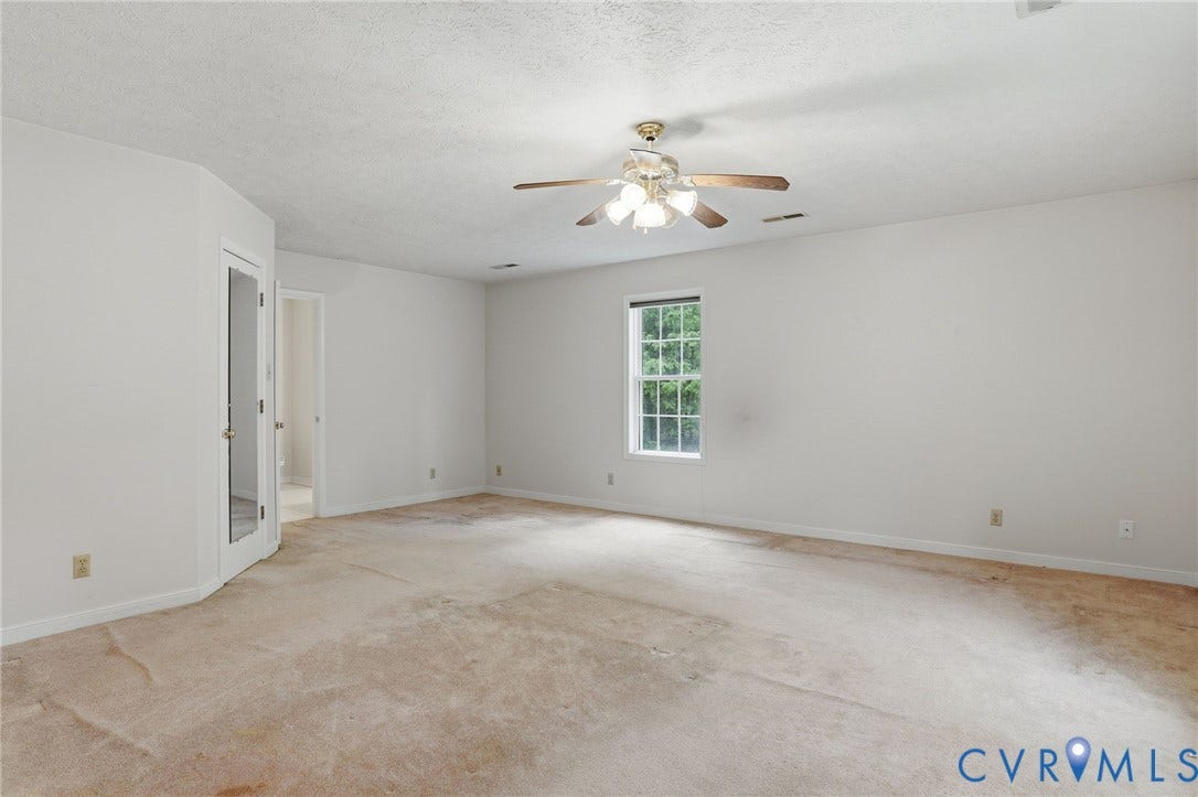 1570 Meade Point Drive, Powhatan, VA 23139 Primary bedroom w/ walk-in closet and attached full bath. Graet floor plan, primary suite on opposite end of house from bedrooms 2 and 3