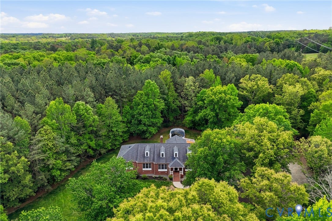 13236 Lea Anna Lane, Hanover, VA 23102 Brick residence with dormer windows, surrounded by mature trees