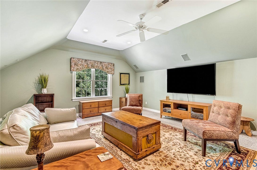 3131 Shadow Creek Drive, Powhatan, VA 23139 Spacious room with a vaulted ceiling, recessed lighting, and a ceiling fan