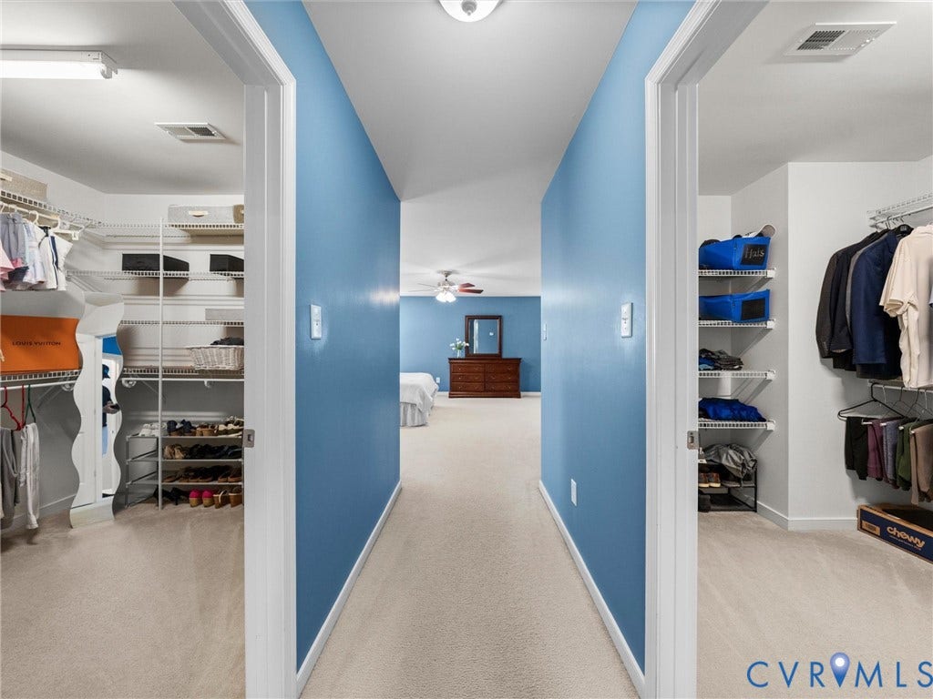 Two primary walk-in closets
